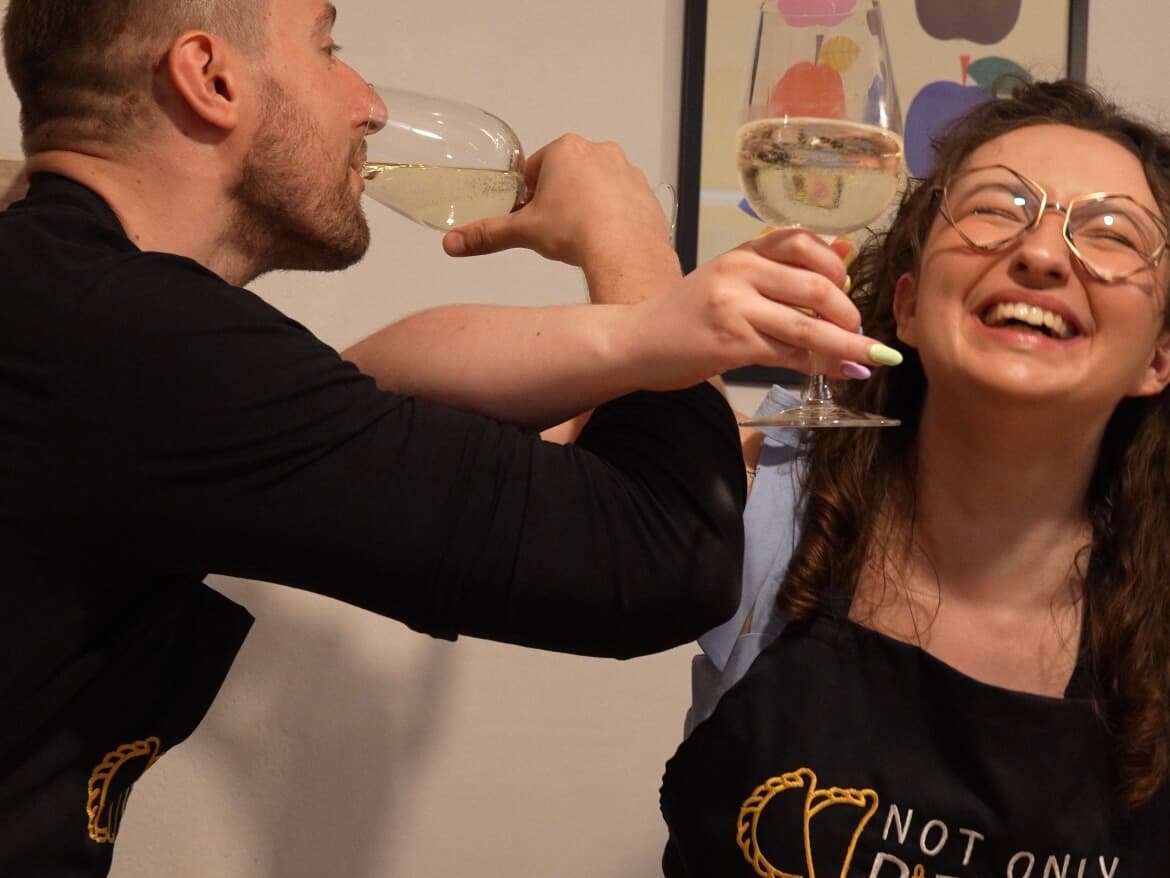 Guests enjoying cider during the pierogi class